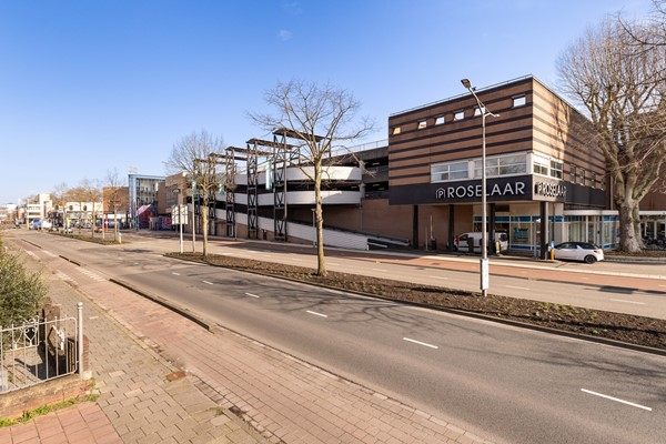 Foto - Te koop: Ruime dubbele benedenwoning met parkeerplaats!